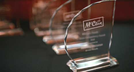 A McCain glass recognition award trophy