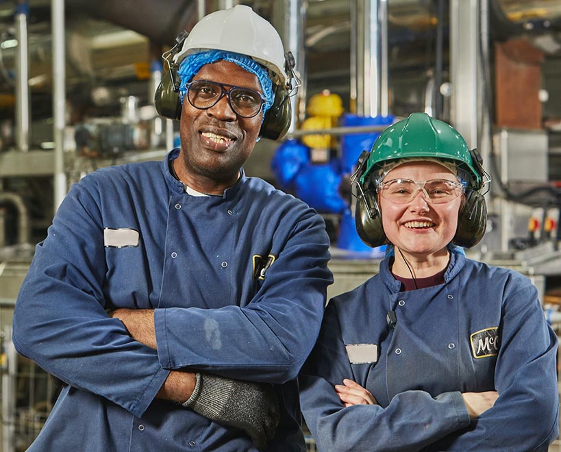 Two McCain Foods production team members in factory