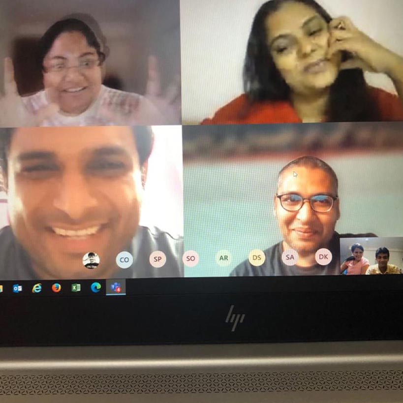 People together on a video call on laptop screen