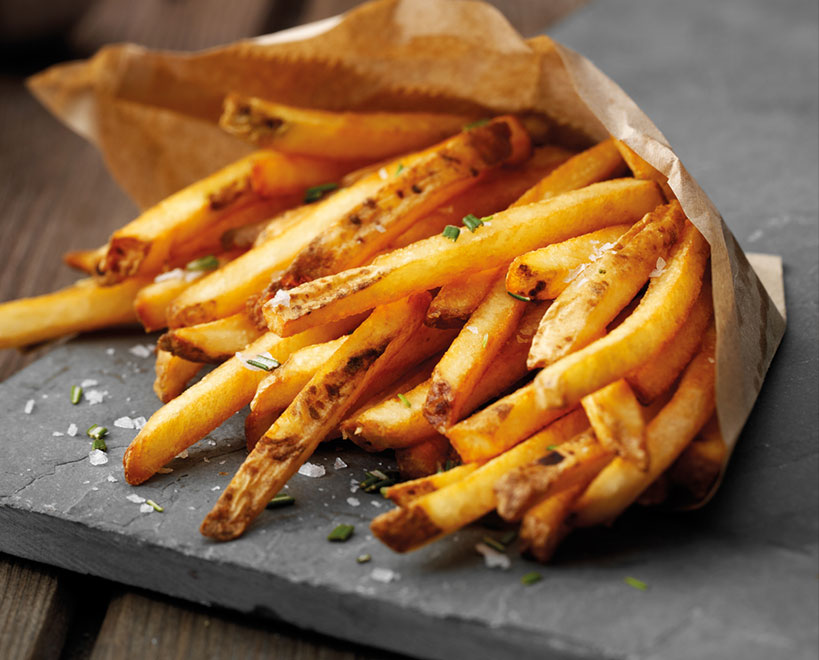 Skin on fries on a slate plate