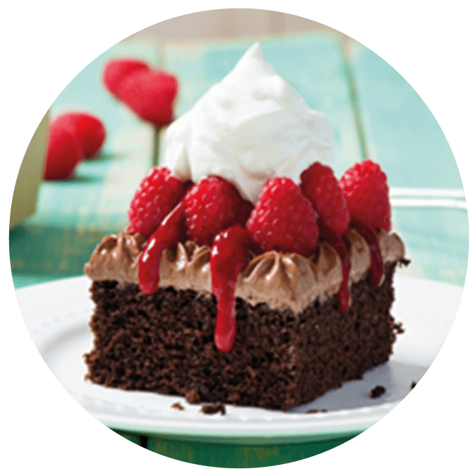 McCain Deep n Delicious chocolate cake, topped with raspberries and cream